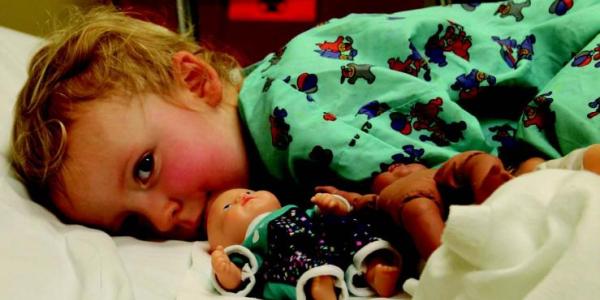 Child in hospital bed